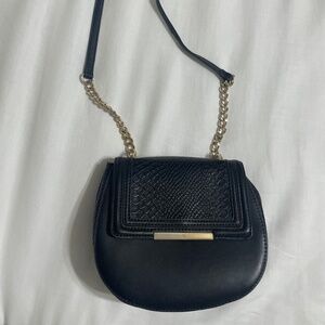 Cute little black purse with gold accent